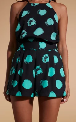 Chica Bella Shorts In Green On Black Dot