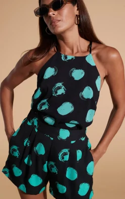 Chica Bella Shorts In Green On Black Dot