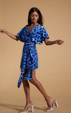 Kansas Mini Wrap Dress In Bright Blue Leopard