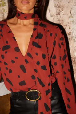 Lyma (Multi-Way) Tie Neck Top In Abstract Dot Black On Rust