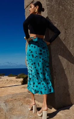 Renzo Skirt In Abstract Dot Black On Teal