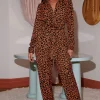 Roxanna Jumpsuit In Orange On Black Leopard