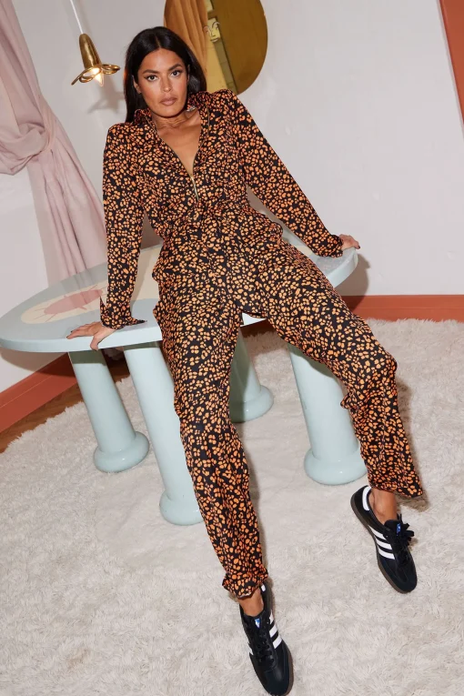 Roxanna Jumpsuit In Orange On Black Leopard