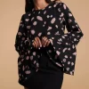 Suvi Flare Sleeve Top In Abstract Dot Sand On Black