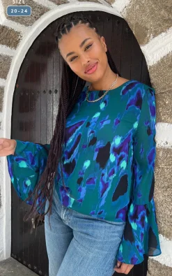 Suvi Flare Sleeve Top In Camo Abstract Blue On Green- Extended Sizing