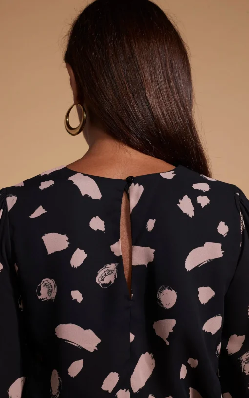 Suvi Flare Sleeve Top In Abstract Dot Sand On Black