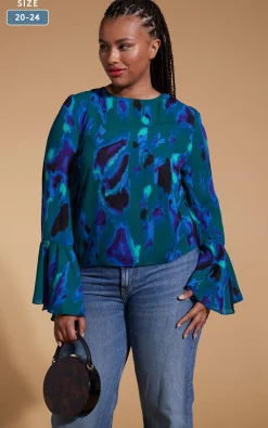 Suvi Flare Sleeve Top In Camo Abstract Blue On Green- Extended Sizing