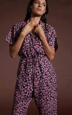 Zeta Jumpsuit In Pink On Black Leopard