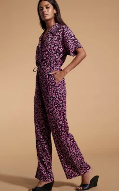 Zeta Jumpsuit In Pink On Black Leopard
